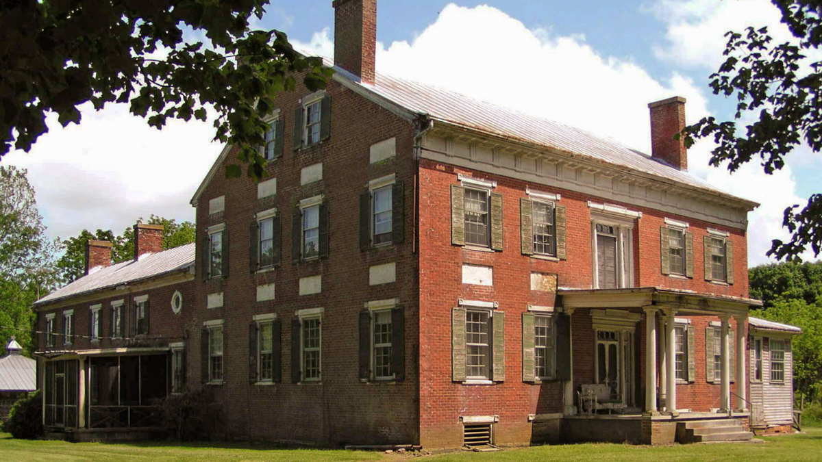 The Preston House—made of brick with two stories and an attic.