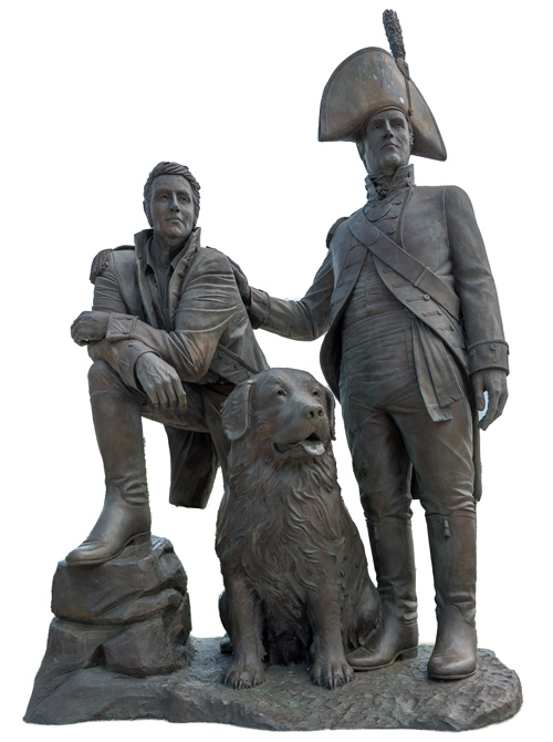 Statue of two men in 19th century military uniforms and a Newfoundland dog