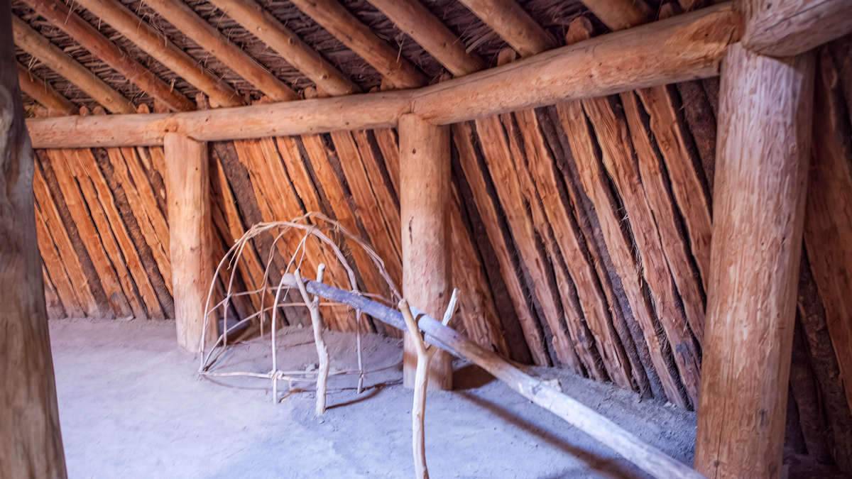 Wood beams and planks covered with dirt