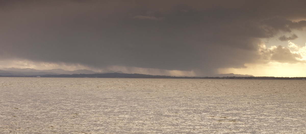 A huge dark cloud moves to show some clear sky